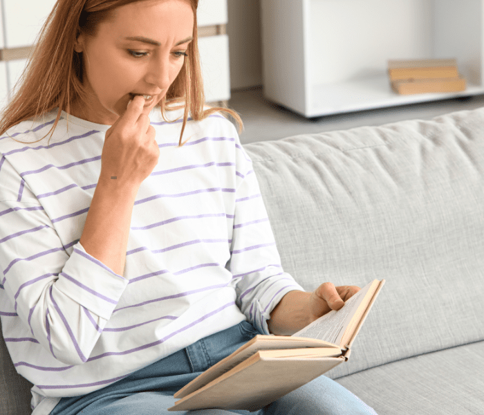 woman biting nails